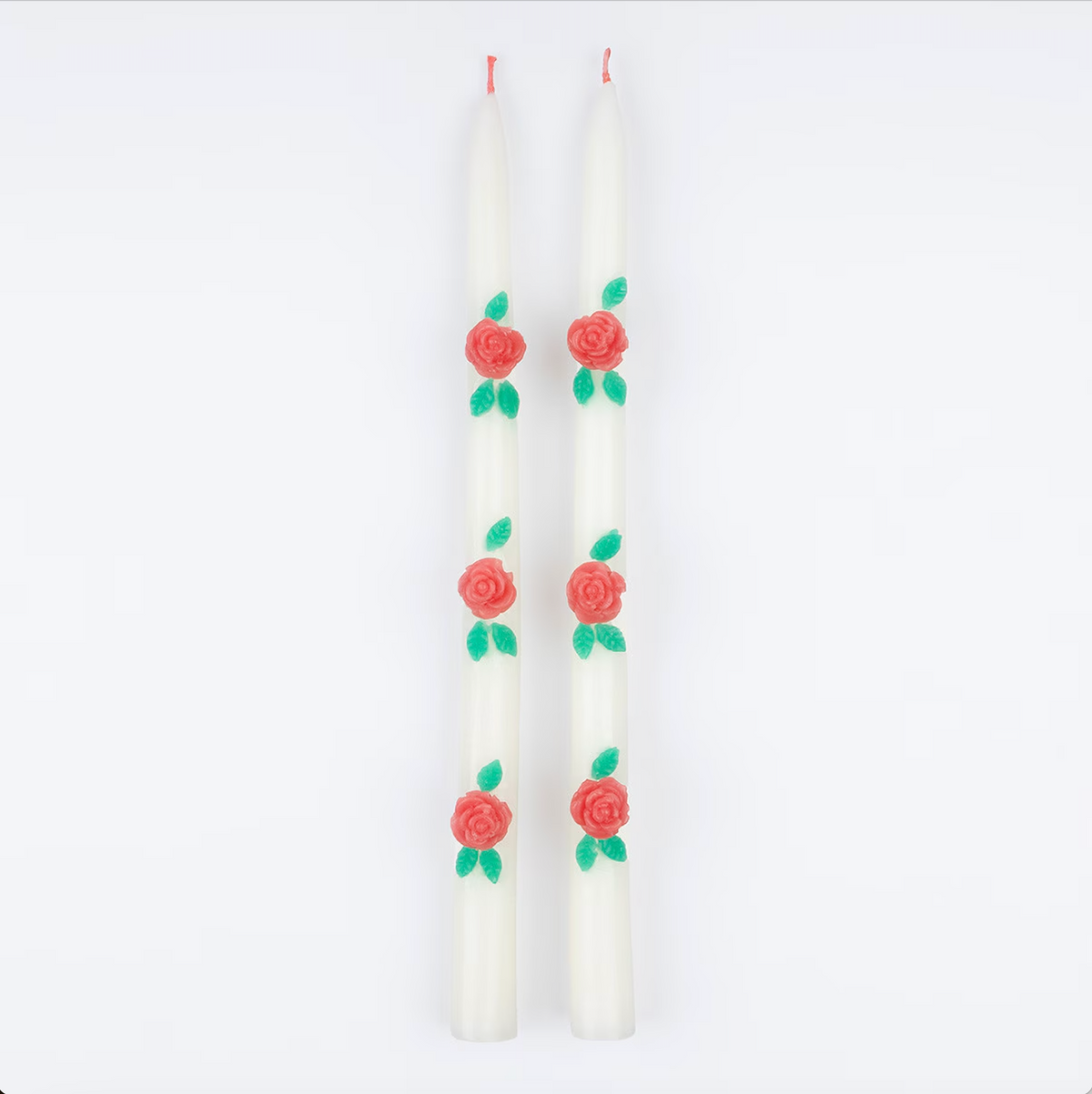 taper candles with roses